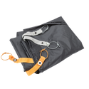 Folded gray Copper Spur UL1 Bikepack Footprint with orange and silver straps on a white background