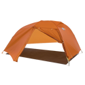 Orange Copper Spur UL3 mtnGLO® camping tent with a brown groundsheet on a white background