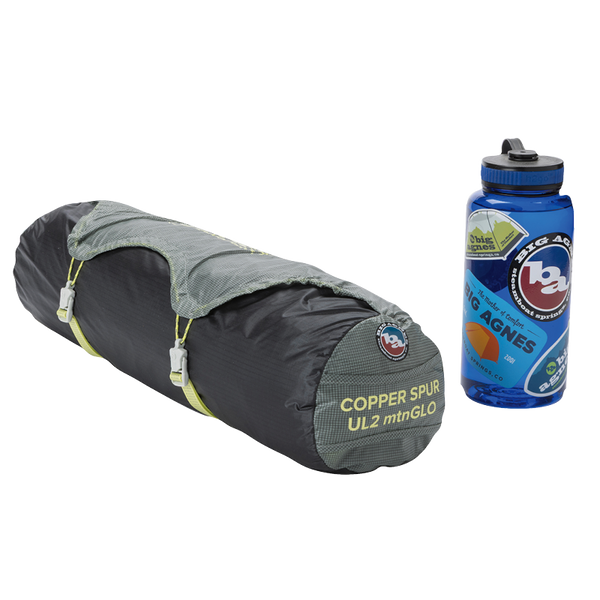 Copper Spur UL3 mtnGLO® Camping tent and water bottle on a white background