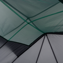 Close-up of overlapping translucent Pitchpine VST 1.5 fabric panels by Big Agnes Canada in green and gray, featuring stitched lines and geometric shapes that create an abstract, ultralight tent-inspired pattern.