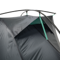 Close-up of the Big Agnes Canada Pitchpine VST 1.5 ultralight tent in dark gray Hyperbead fabric, showing a partially open vent with green trim and black poles, displayed on a white background.