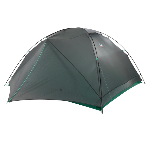 The Big Agnes Canada Sarvis VST 3 is a green, dome-shaped tent with rainfly and multiple support poles. Lightweight and compact, it’s a durable ultralight shelter for camping, shown set up against a plain white background.