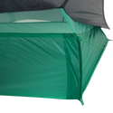 Close-up of the corner of the Big Agnes String Ridge VST 1.5 tent, an ultralight shelter featuring mesh upper panels, solid green lower fabric, and precise stitching that showcases its quality construction.