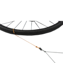 Bicycle wheel with a cable and housing on a white background
